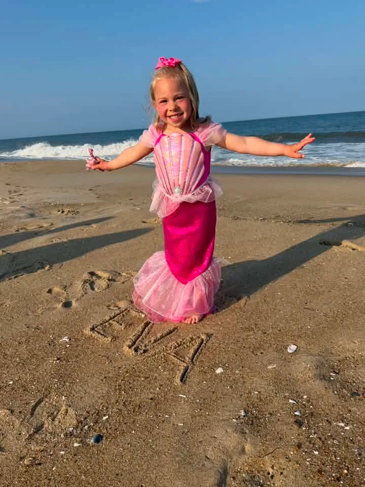 mermaid girl on ocean city beach