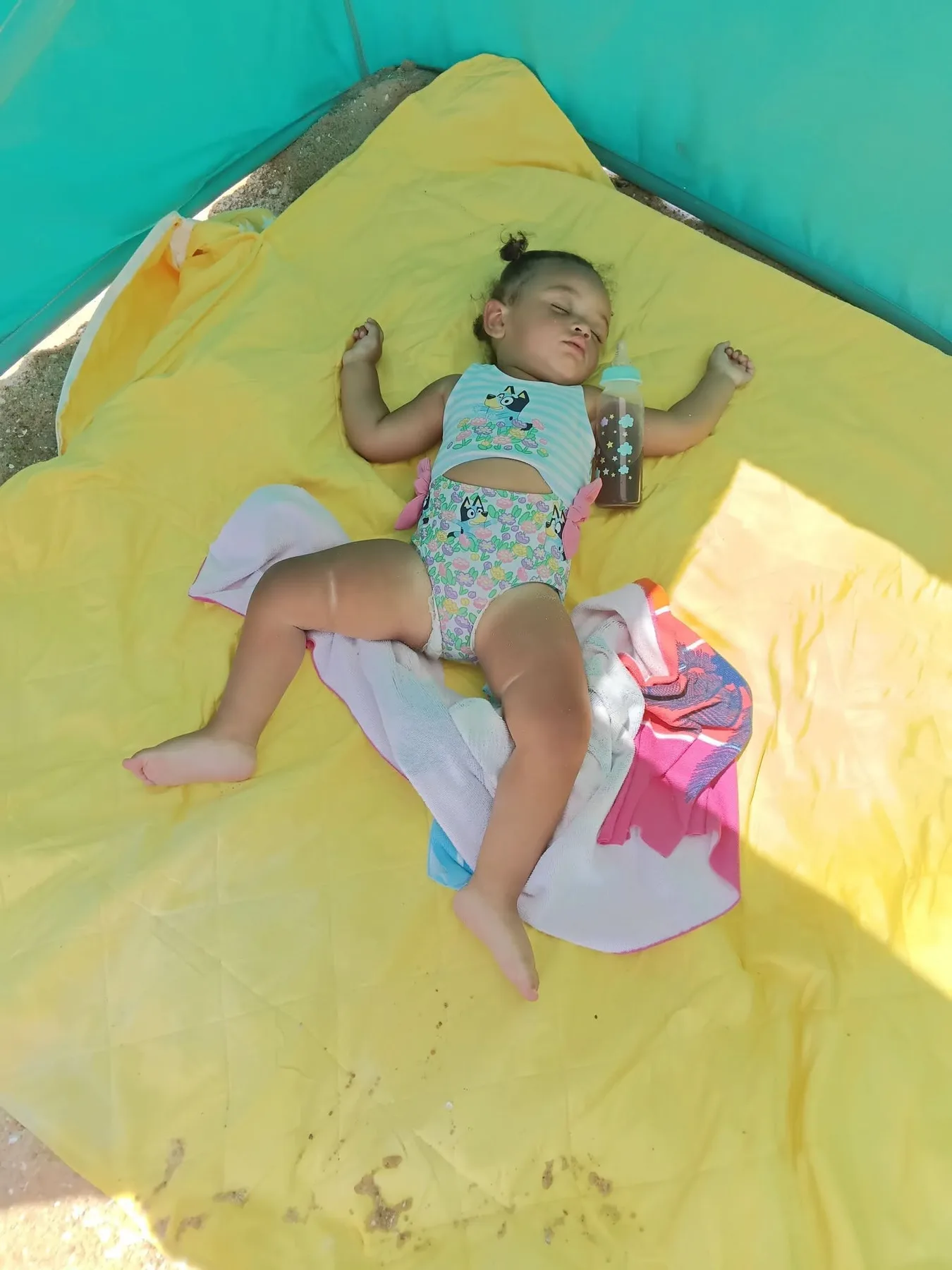 sleeping child in tent on beach in ocmd