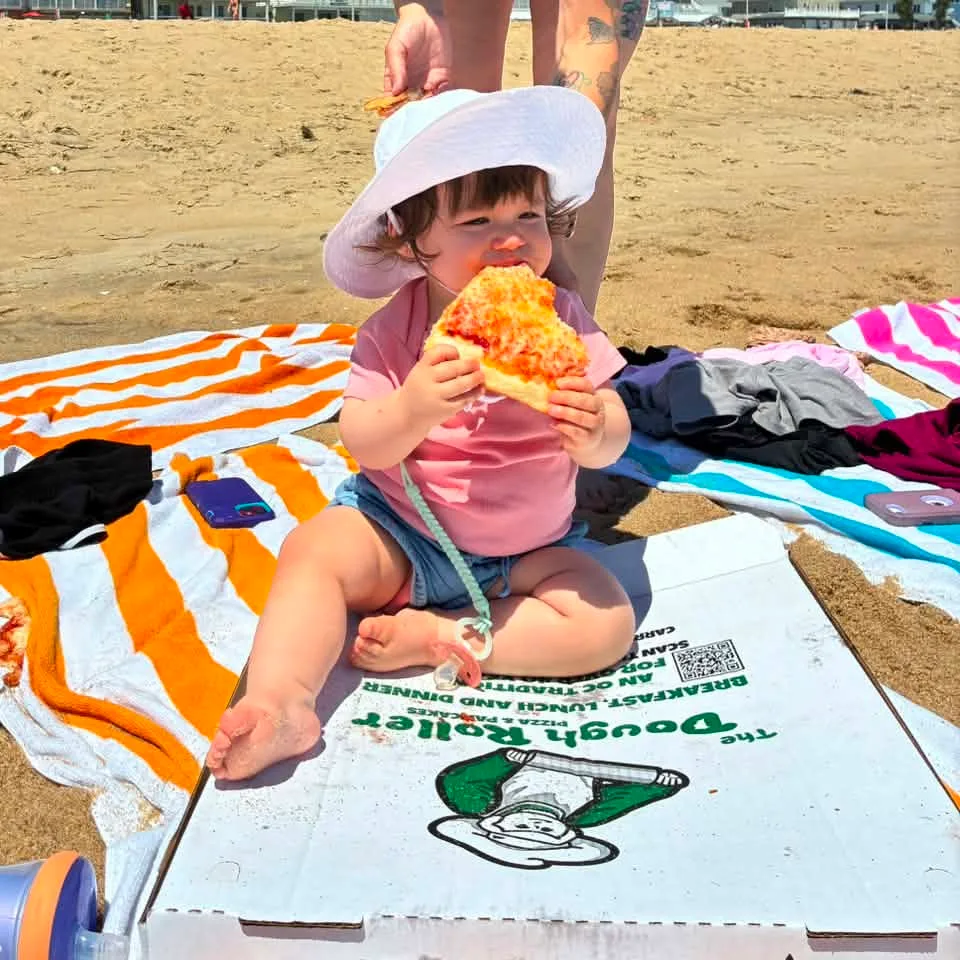 Julieanne Kaliontgis - Pizza and the beach, what else could a baby need❤️ keeping Dough Rollers in the family starting young.