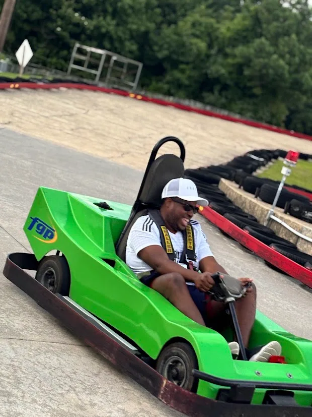 Driver rides a go cart at Baja Amusements in Ocean City, Maryland.