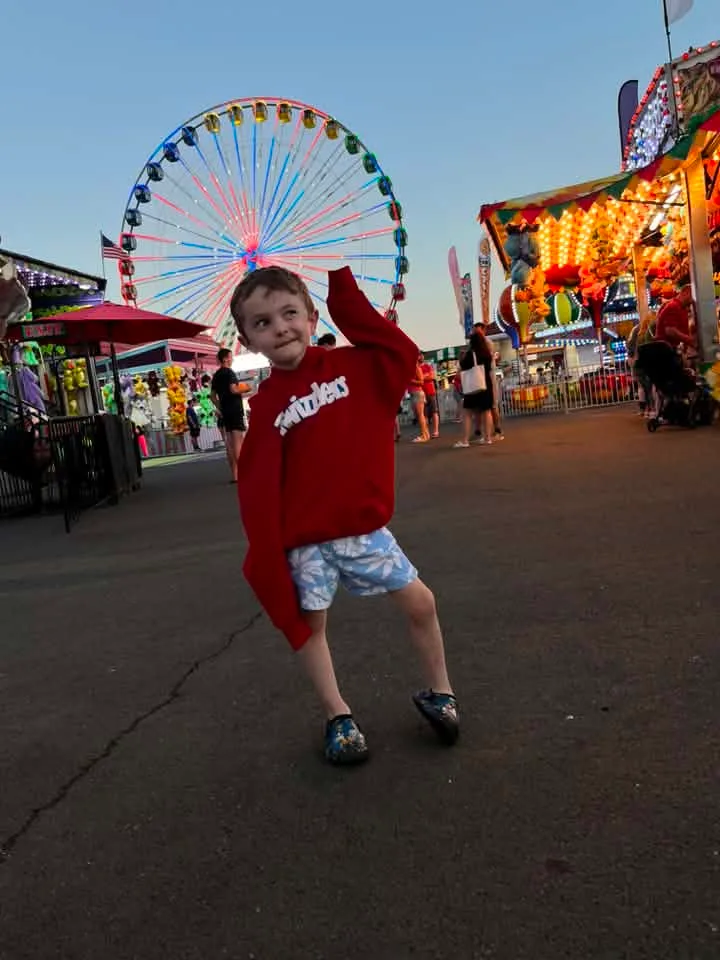 boy on ocean city boardwalk