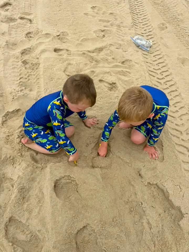 Sierra Williams - My boys “digging for treasure” we love Ocean City 