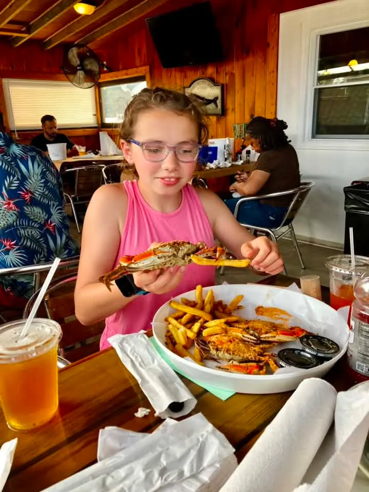 girl eating crabs in ocean city md