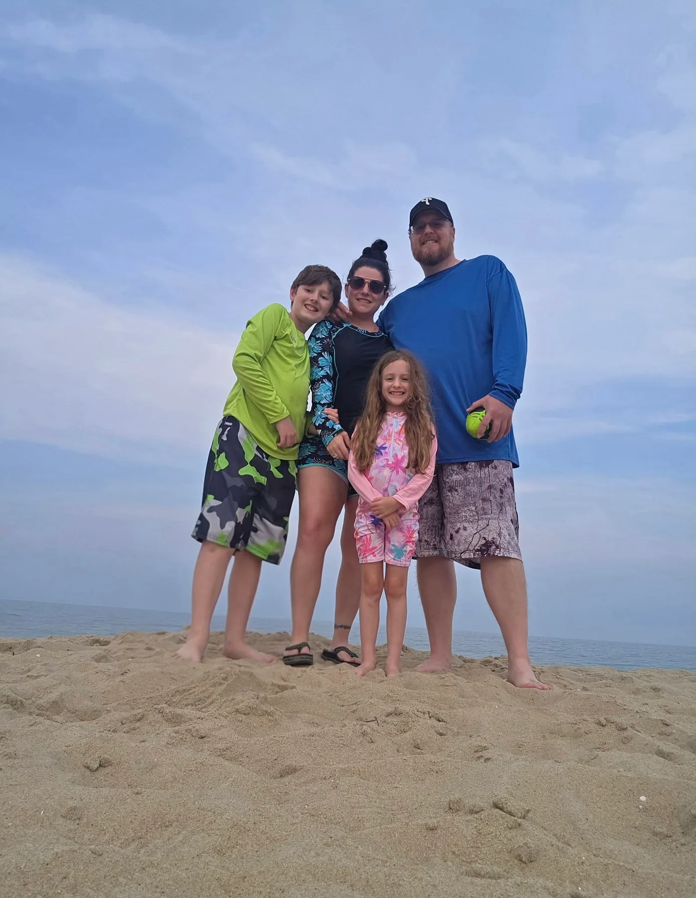 Liss Lantz - annual family photo on the beach 🐚