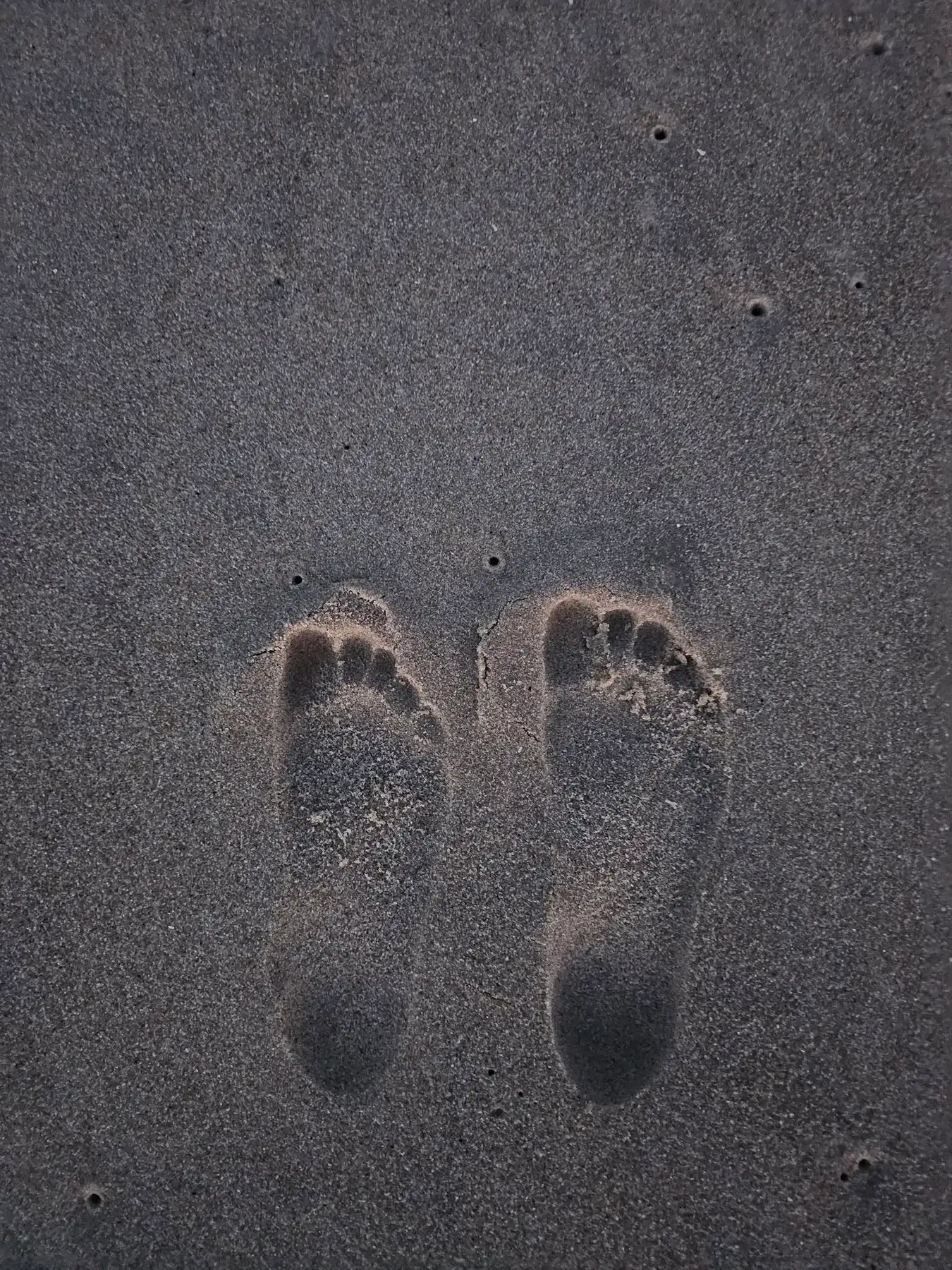 Lauren Williams - Taking a nice walk on the beach and wanted to see how much bigger my foot was to my 10 year-old boy