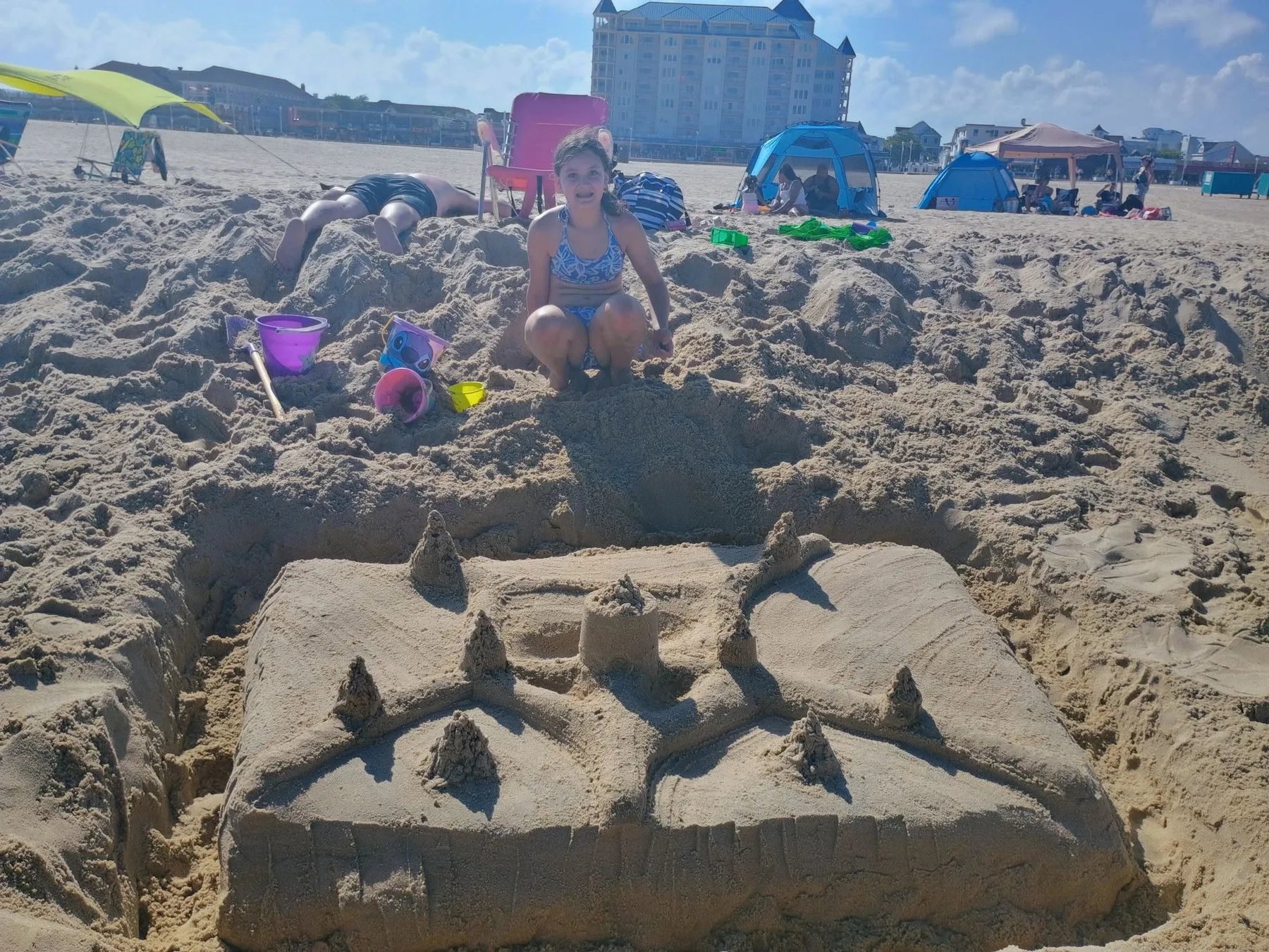 Kelly Swinge R - 13 years of building sand castles and this is her first sand castle all by herself while Dad slept in the sand!! Beyond proud of her and the way it came out!!