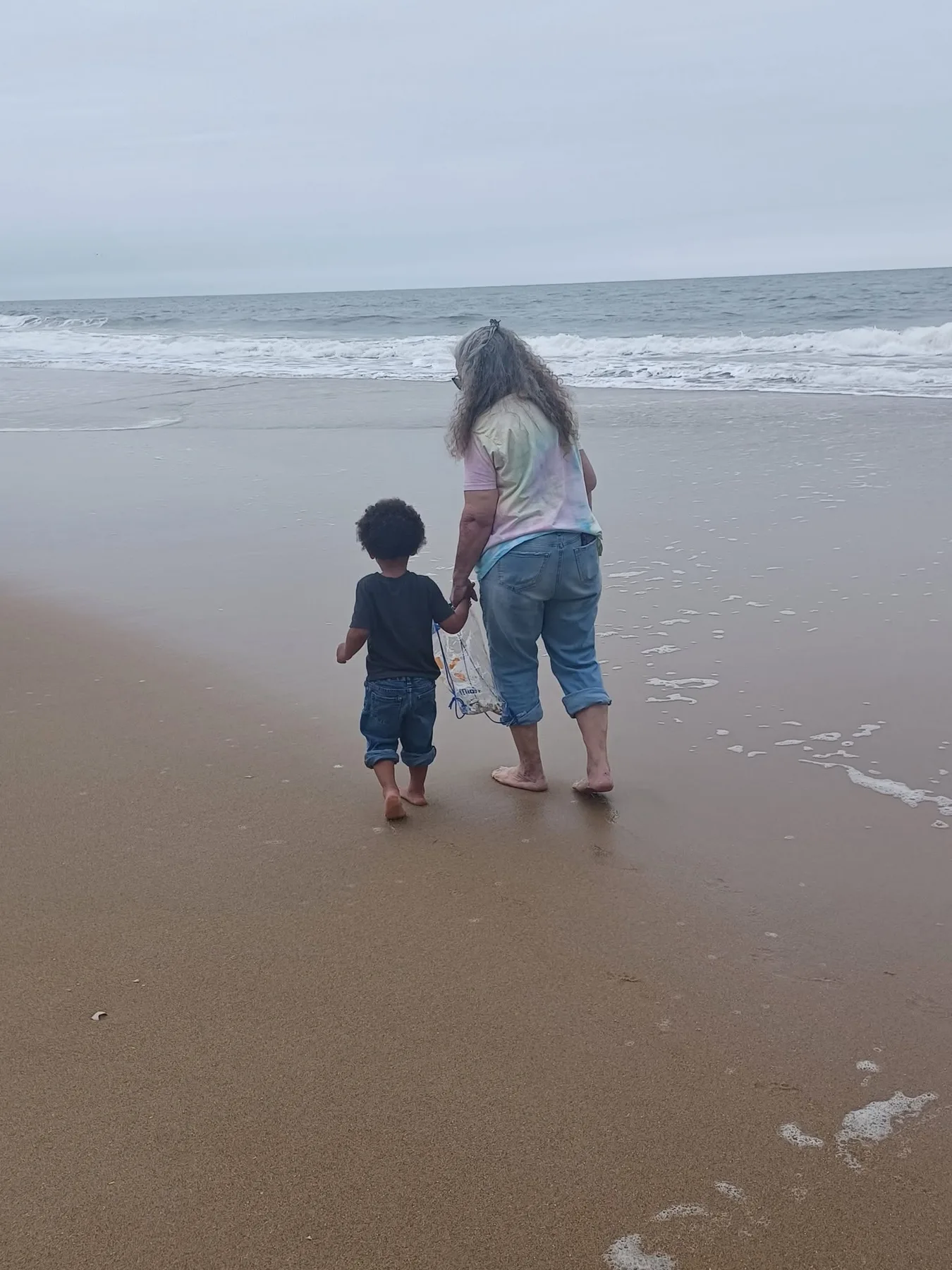 Brad Green - Grammaw and grandson beachwalking