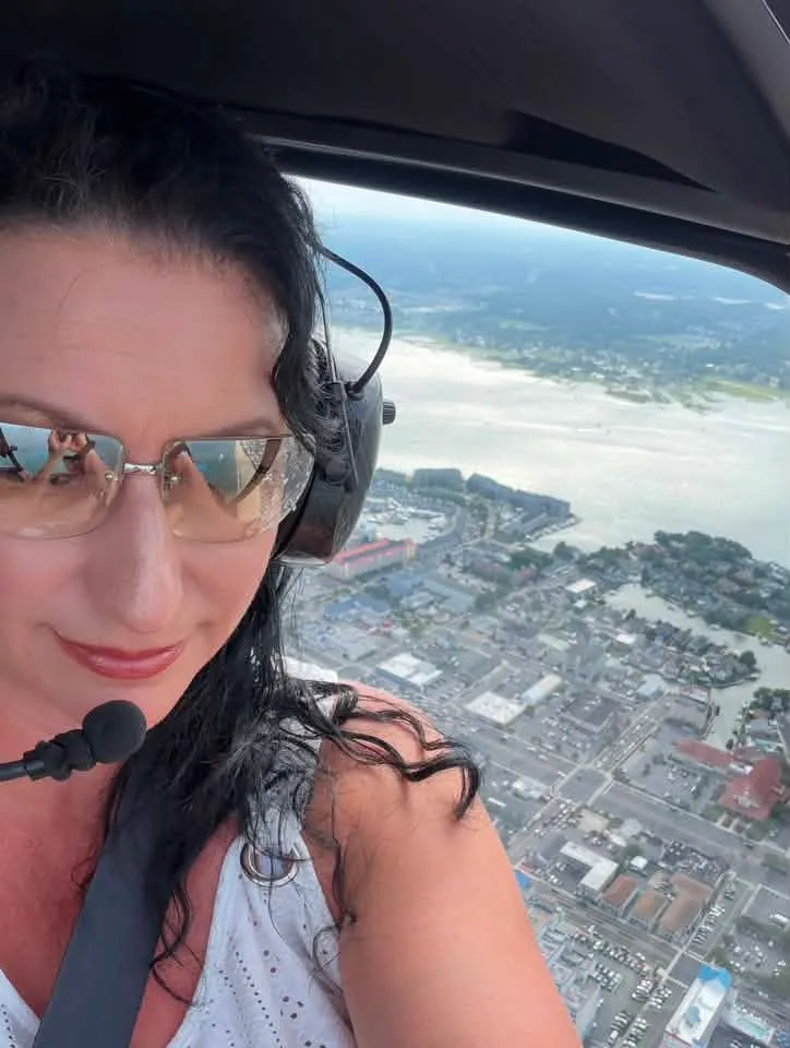 Candace Compton - Helicopter ride over the beach