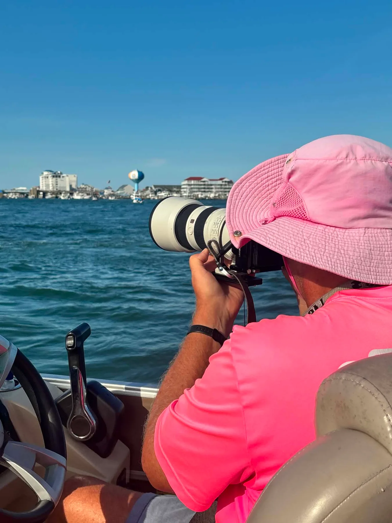 Jim Halverson, OC Yacht Shots, takes a pic with Ocean City iconic images in the background.