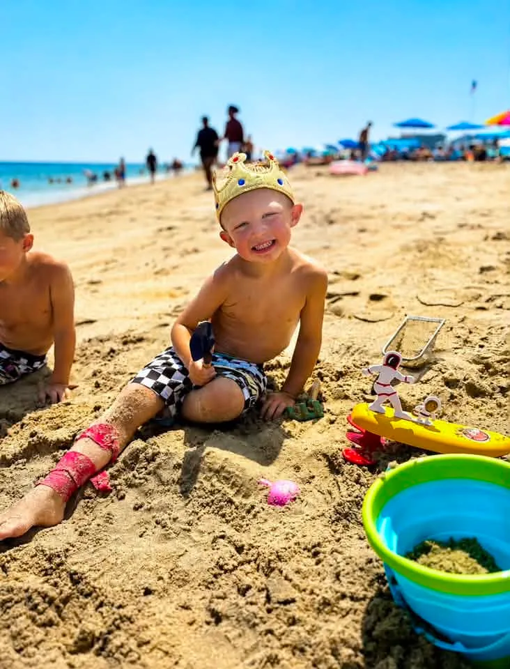 Amy Phucas - Nothing says 4th birthday quite like sandy toes, sunshine, beach toys, and a crown fit for the birthday king!