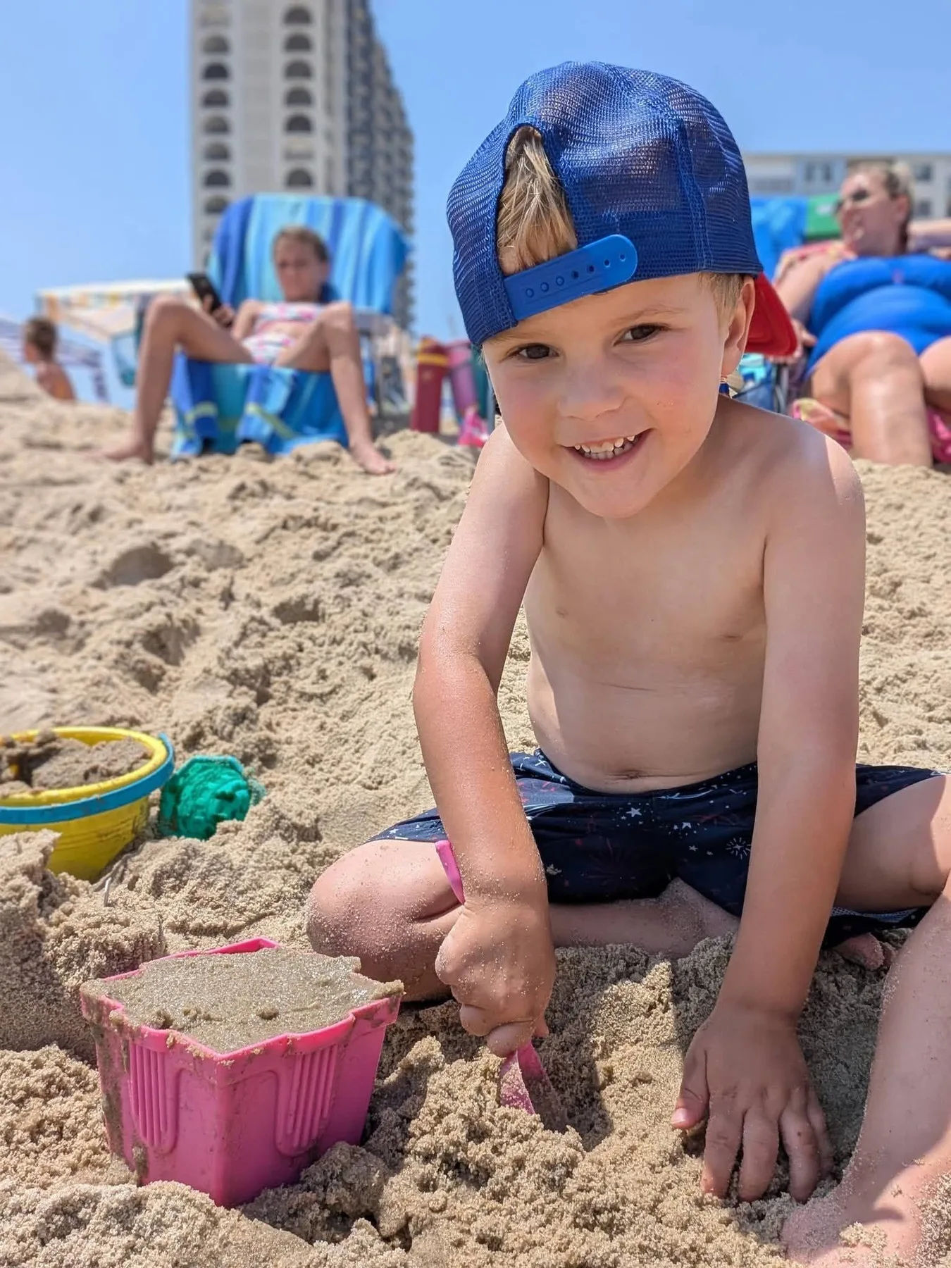 buidling a sand castle on beach in ocmd