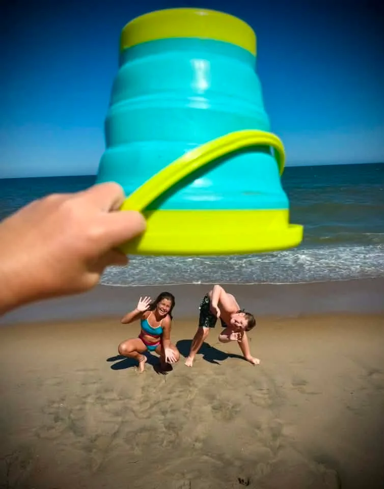 Kristi Keller - We’re never ready to leave the beach…. had to scoop my kiddos up with a sandy beach bucket … beach weeks are our favorite in OCMD !