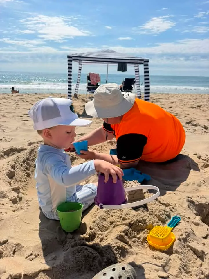 kids playhing on the beach in ocean city md