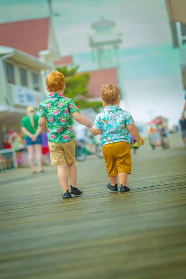little boys on the boardwalk in ocean city md