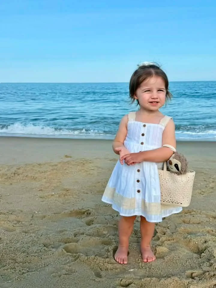 
Felicia Dzielak-Marsh - Violet and her sloth friend “Pokey” enjoying the beach before dinner!