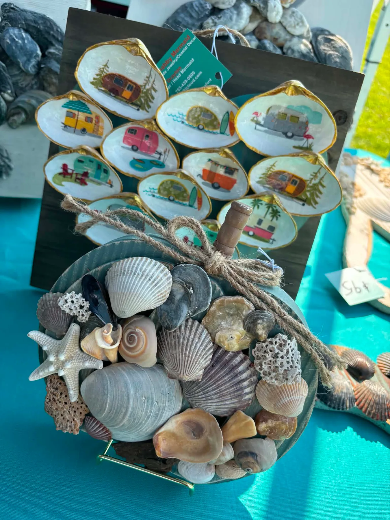 Local artisans celebrate at the Seafood Festival with ocean themed crafts.