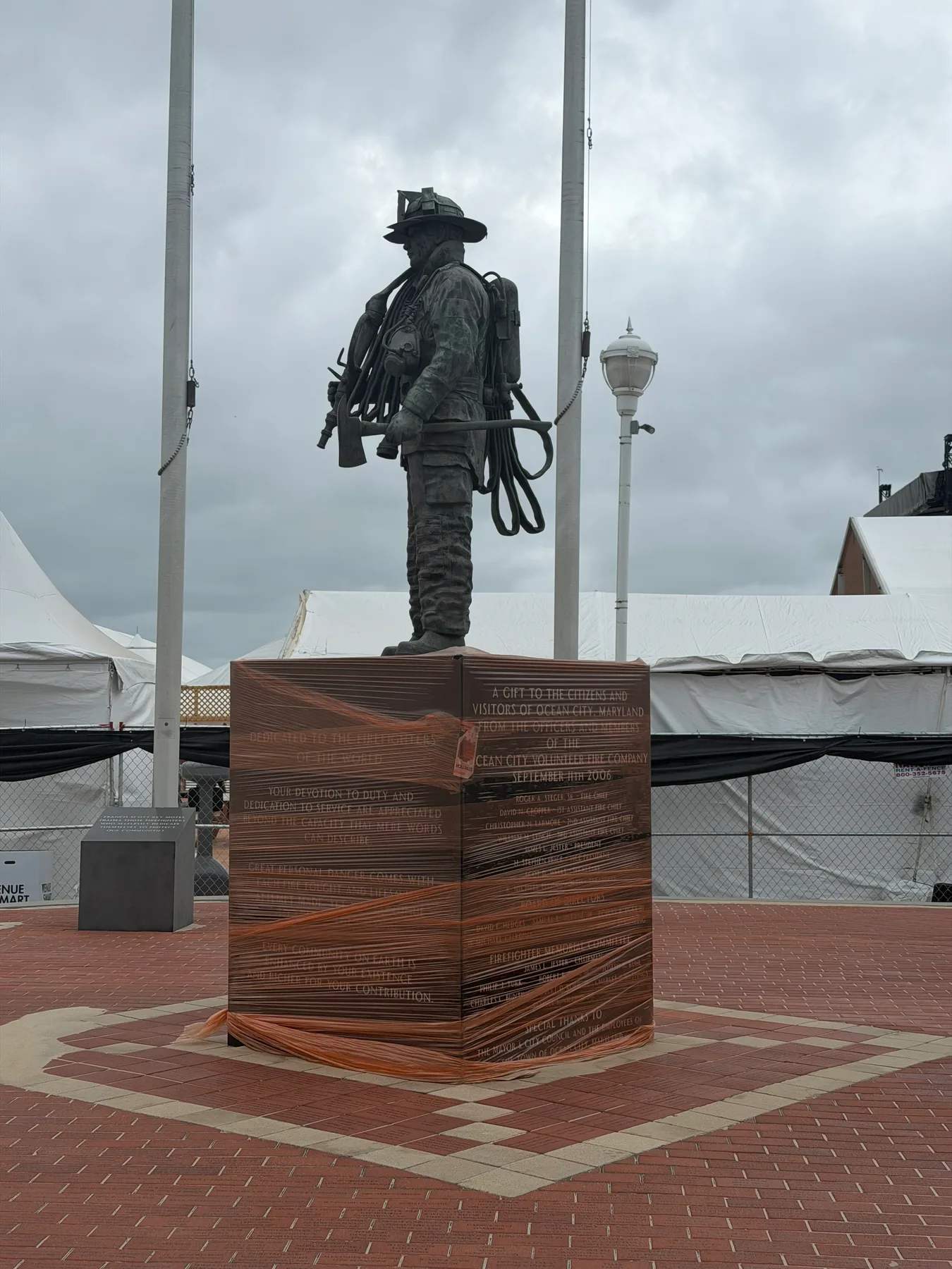 shrink wrapped fireman's sculpture on the boardwalk in Ocean City, MD