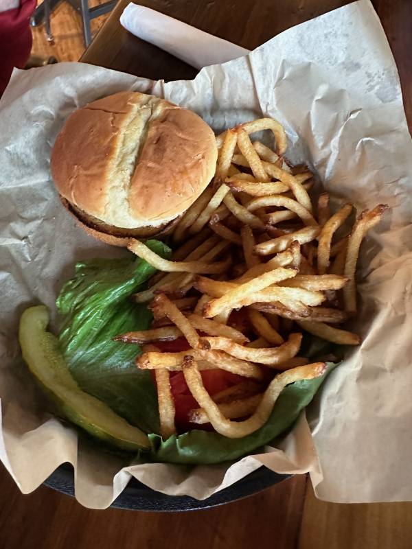 crabcake with fries and an pickle