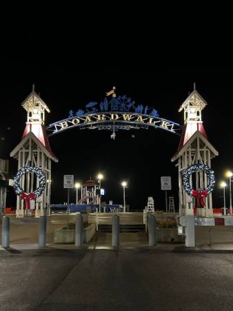 Christmas wreaths on OC Boardwalk archway